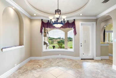 Elegantly situated on the 18th hole of Comanche Trace's on The Club At Comanche Trace in Texas - for sale on GolfHomes.com, golf home, golf lot