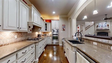 Experience luxury living in this beautifully appointed condo on Harbor Lakes Golf Club in Texas - for sale on GolfHomes.com, golf home, golf lot