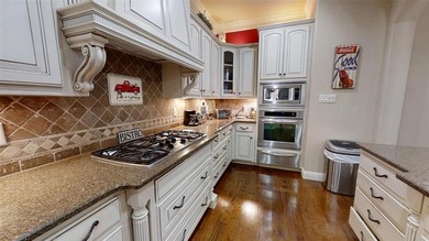 Experience luxury living in this beautifully appointed condo on Harbor Lakes Golf Club in Texas - for sale on GolfHomes.com, golf home, golf lot