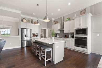 Nestled on a breathtaking 0.43-acre estate lot in the on Champions Pointe Golf Course in Indiana - for sale on GolfHomes.com, golf home, golf lot