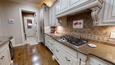 Experience luxury living in this beautifully appointed condo on Harbor Lakes Golf Club in Texas - for sale on GolfHomes.com, golf home, golf lot