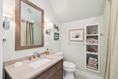 Tucked away on a quiet cul-de-sac, surrounded by magnolias and on Santa Rosa Golf and Beach Club in Florida - for sale on GolfHomes.com, golf home, golf lot