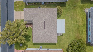 A completely updated 1,124 square foot two-bedroom, two bath on Tampa Bay Golf and Country Club in Florida - for sale on GolfHomes.com, golf home, golf lot