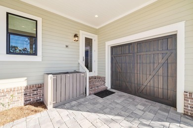 Tucked away on a quiet cul-de-sac, surrounded by magnolias and on Santa Rosa Golf and Beach Club in Florida - for sale on GolfHomes.com, golf home, golf lot