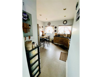 INVESTOR Opportunity in Miami Springs. AZURE, a historic 2-story on Miami Springs Golf and Country Club in Florida - for sale on GolfHomes.com, golf home, golf lot