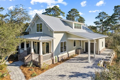 Tucked away on a quiet cul-de-sac, surrounded by magnolias and on Santa Rosa Golf and Beach Club in Florida - for sale on GolfHomes.com, golf home, golf lot