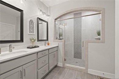 Nestled on a breathtaking 0.43-acre estate lot in the on Champions Pointe Golf Course in Indiana - for sale on GolfHomes.com, golf home, golf lot