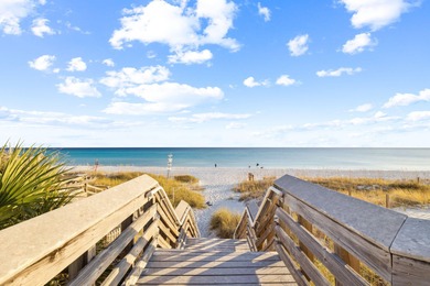 Tucked away on a quiet cul-de-sac, surrounded by magnolias and on Santa Rosa Golf and Beach Club in Florida - for sale on GolfHomes.com, golf home, golf lot