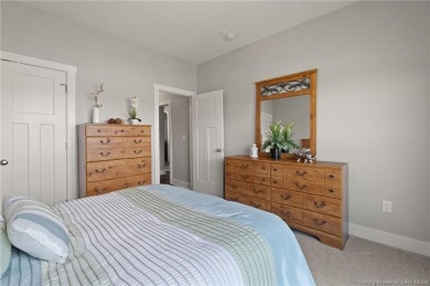 Nestled on a breathtaking 0.43-acre estate lot in the on Champions Pointe Golf Course in Indiana - for sale on GolfHomes.com, golf home, golf lot