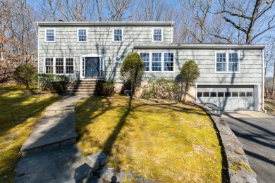 This quintessential center hall colonial is nestled at the end on Woodway Country Club in Connecticut - for sale on GolfHomes.com, golf home, golf lot