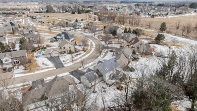 This stunning 4-bedroom, two-story home sits on a scenic on Aldeen Golf Club in Illinois - for sale on GolfHomes.com, golf home, golf lot