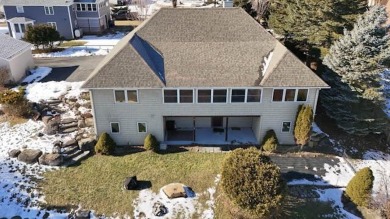 This custom-built home with energy efficiency in mind boasts on Harmony Golf Club in New York - for sale on GolfHomes.com, golf home, golf lot