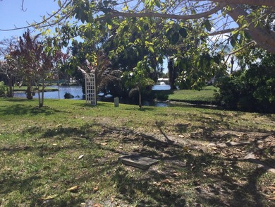 Meticulously maintained home in the much sought after Spanish on Spanish Lakes I in Florida - for sale on GolfHomes.com, golf home, golf lot