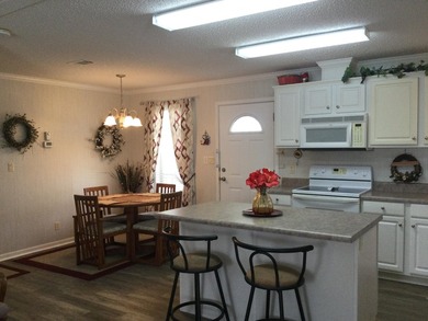 Meticulously maintained home in the much sought after Spanish on Spanish Lakes I in Florida - for sale on GolfHomes.com, golf home, golf lot