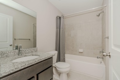 Enter this beautiful townhome and experience high-end finishes on Normandy Oaks Golf Club in Michigan - for sale on GolfHomes.com, golf home, golf lot