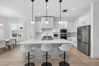 Waterfront living meets effortless luxury in this fully upgraded on Palm Beach Gardens Golf Course in Florida - for sale on GolfHomes.com, golf home, golf lot