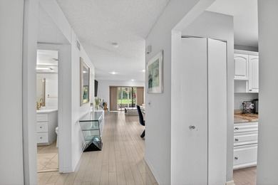 Welcome to your charming first-floor corner unit with beautiful on Hunters Run Golf and Country Club in Florida - for sale on GolfHomes.com, golf home, golf lot