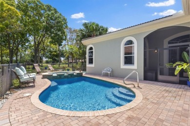 Spectacular 3BR, 3Bath, 2CG West Indies pool home in on Oak Harbor Country Club in Florida - for sale on GolfHomes.com, golf home, golf lot