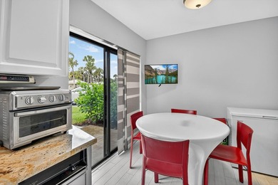 Welcome to your charming first-floor corner unit with beautiful on Hunters Run Golf and Country Club in Florida - for sale on GolfHomes.com, golf home, golf lot