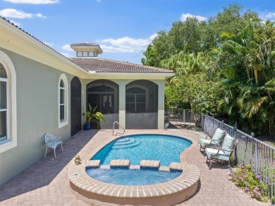 Spectacular 3BR, 3Bath, 2CG West Indies pool home in on Oak Harbor Country Club in Florida - for sale on GolfHomes.com, golf home, golf lot