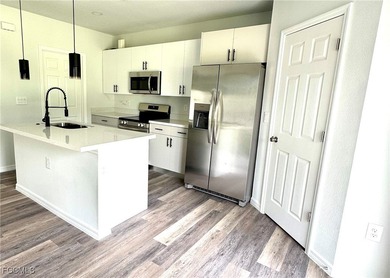 NEW BUILD COMPLETE - MOVE-IN READY - CORNET LOT The 1 on Mirror Lakes Golf Club in Florida - for sale on GolfHomes.com, golf home, golf lot