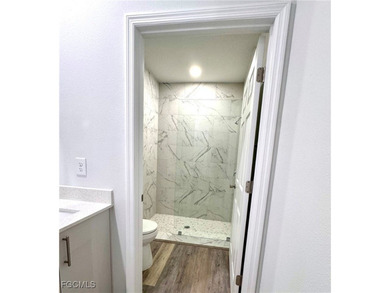 NEW BUILD COMPLETE - MOVE-IN READY - CORNET LOT The 1 on Mirror Lakes Golf Club in Florida - for sale on GolfHomes.com, golf home, golf lot