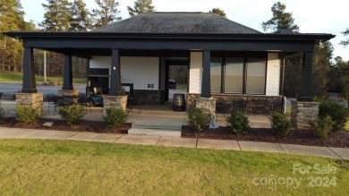 Welcome to this fantastic opportunity to own nearly half an acre on Edgewater Golf Club in South Carolina - for sale on GolfHomes.com, golf home, golf lot