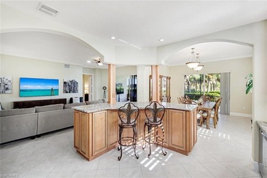 Beautifully appointed first-floor coach home in the double-gated on The Rookery At Marco in Florida - for sale on GolfHomes.com, golf home, golf lot