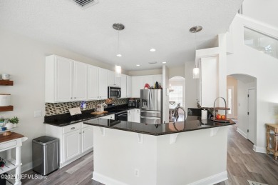 Welcome to this beautifully updated 2-story home nestled on an on Golf Club At South Hampton in Florida - for sale on GolfHomes.com, golf home, golf lot