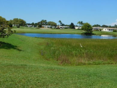 PRICE REDUCED ! 2 bedroom/2 bath on the golf course with a water on Savanna Golf Club in Florida - for sale on GolfHomes.com, golf home, golf lot