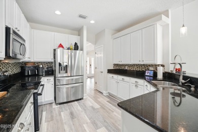 Welcome to this beautifully updated 2-story home nestled on an on Golf Club At South Hampton in Florida - for sale on GolfHomes.com, golf home, golf lot