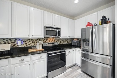 Welcome to this beautifully updated 2-story home nestled on an on Golf Club At South Hampton in Florida - for sale on GolfHomes.com, golf home, golf lot