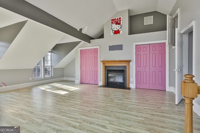 This spacious 5-bedroom, 5-bath home offers 4,405 square feet of on Canongate On White Oak Golf Course in Georgia - for sale on GolfHomes.com, golf home, golf lot