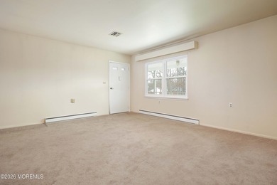 This 2-bedroom, 1-bath Upper Level Lancaster model offers a on Greenbriar Woodlands in New Jersey - for sale on GolfHomes.com, golf home, golf lot