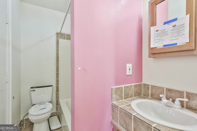 This spacious 5-bedroom, 5-bath home offers 4,405 square feet of on Canongate On White Oak Golf Course in Georgia - for sale on GolfHomes.com, golf home, golf lot