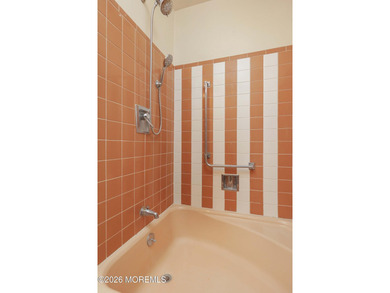 This 2-bedroom, 1-bath Upper Level Lancaster model offers a on Greenbriar Woodlands in New Jersey - for sale on GolfHomes.com, golf home, golf lot