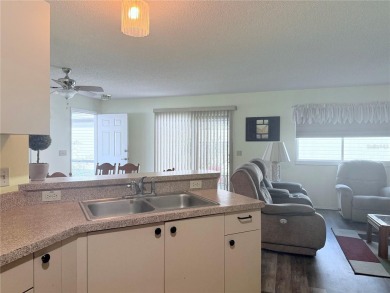 Welcome to this charming 2-bedroom, 2-bathroom fully furnished on The Links of Spruce Creek in Florida - for sale on GolfHomes.com, golf home, golf lot