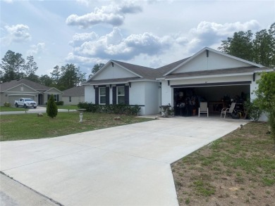 Immaculately maintained as new, built in 2021, this 4-bedroom on Lake Diamond Golf and Country Club in Florida - for sale on GolfHomes.com, golf home, golf lot