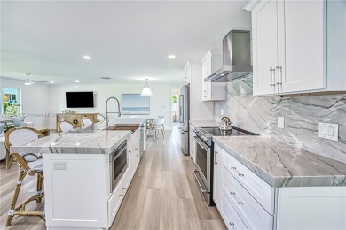Welcome to 1073 Sand Castle Rd -- a fully renovated on The Dunes Golf and Tennis Club in Florida - for sale on GolfHomes.com, golf home, golf lot