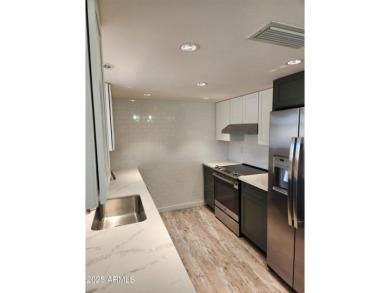 Experience modern living in this beautifully remodeled 2 bed/2 on Stardust Golf Course in Arizona - for sale on GolfHomes.com, golf home, golf lot