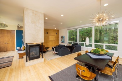 This Mid-Century Modern masterpiece is located near Lake on Grand Haven Golf Club in Michigan - for sale on GolfHomes.com, golf home, golf lot