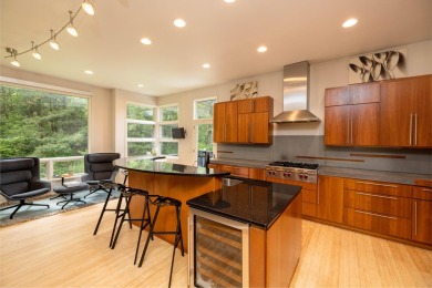 This Mid-Century Modern masterpiece is located near Lake on Grand Haven Golf Club in Michigan - for sale on GolfHomes.com, golf home, golf lot