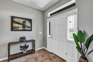 IMMACULATELY MAINTAINED 3 BEDROOM, 2 BATH LOW-MAINTENANCE STUCCO on Arlington Ridge Golf Club in Florida - for sale on GolfHomes.com, golf home, golf lot