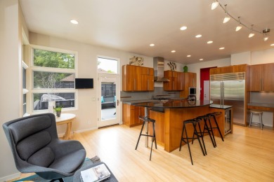 This Mid-Century Modern masterpiece is located near Lake on Grand Haven Golf Club in Michigan - for sale on GolfHomes.com, golf home, golf lot