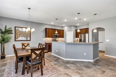 IMMACULATELY MAINTAINED 3 BEDROOM, 2 BATH LOW-MAINTENANCE STUCCO on Arlington Ridge Golf Club in Florida - for sale on GolfHomes.com, golf home, golf lot