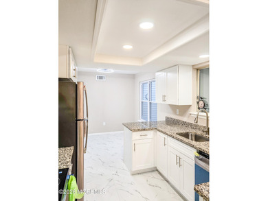 Welcome to this newly renovated 2-bed, 2.5-bath townhouse with on Clearbrook Golf Club in New Jersey - for sale on GolfHomes.com, golf home, golf lot