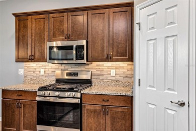 IMMACULATELY MAINTAINED 3 BEDROOM, 2 BATH LOW-MAINTENANCE STUCCO on Arlington Ridge Golf Club in Florida - for sale on GolfHomes.com, golf home, golf lot