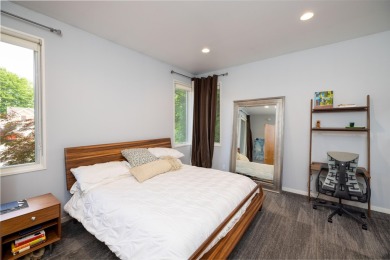 This Mid-Century Modern masterpiece is located near Lake on Grand Haven Golf Club in Michigan - for sale on GolfHomes.com, golf home, golf lot