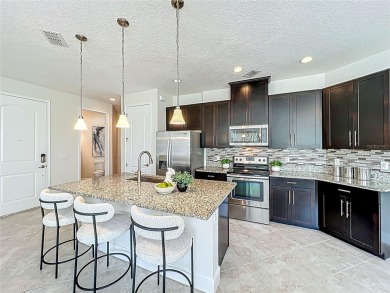 Under contract-accepting backup offers. Beautiful END-UNIT on Eagle Creek Golf Club in Florida - for sale on GolfHomes.com, golf home, golf lot