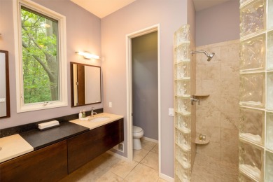 This Mid-Century Modern masterpiece is located near Lake on Grand Haven Golf Club in Michigan - for sale on GolfHomes.com, golf home, golf lot